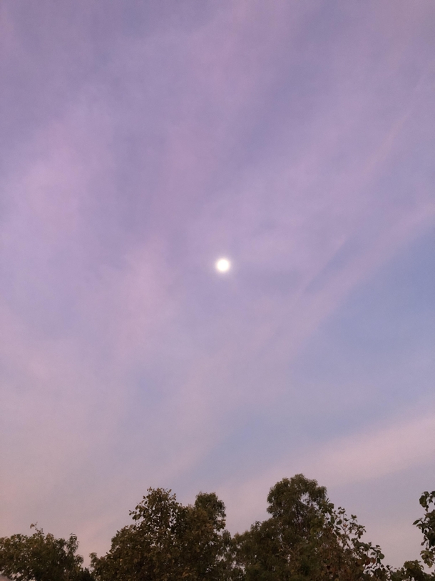Sunset sky with full moon 