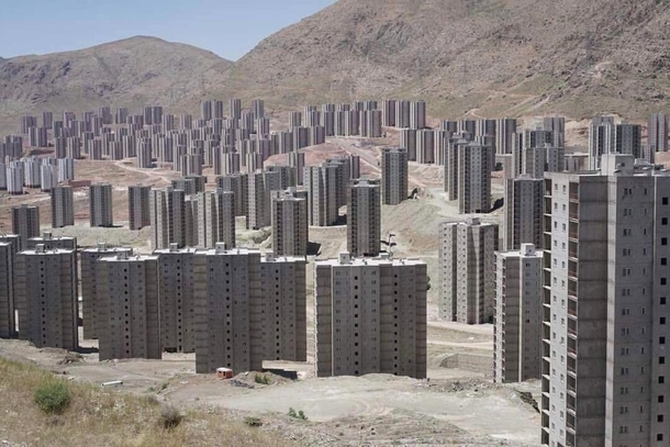 Tehrans Desert Ghost Towers look like a Zombie Movie Waiting to Happen