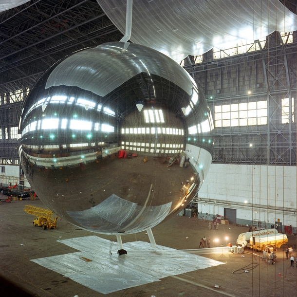 Test inflation of the  ft diameter PAGEOS satellite in a blimp hangar  Once in orbit it was tracked visually as part of an early experiment in global positioning Sightings of the balloon satellite were used to pinpoint a position on the earths surface to 