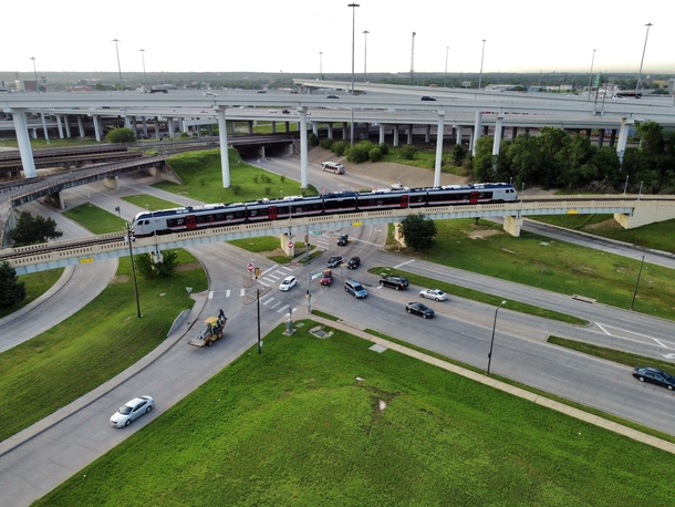 TexRail FLIRT near Fort Worth Central Station I- - I-W interchange in background