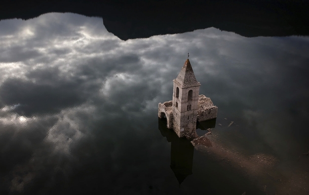th-Century church Vilanova de Sau Spain usually covered by a reservoir exposed by low water levels by Emili Morenatti 