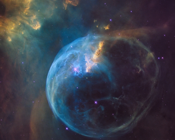 The Bubble Nebula captured by Hubble The bubble effect is caused by the stellar winds from a massive  magnitude star in the center