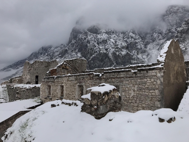 The Castle of San Giovanni blanketed in snow located in Kotor Montenegro