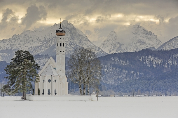 The Church of St Coloman at the foot of the Schwangauer mountains Germany  Photographed by Robert Schller