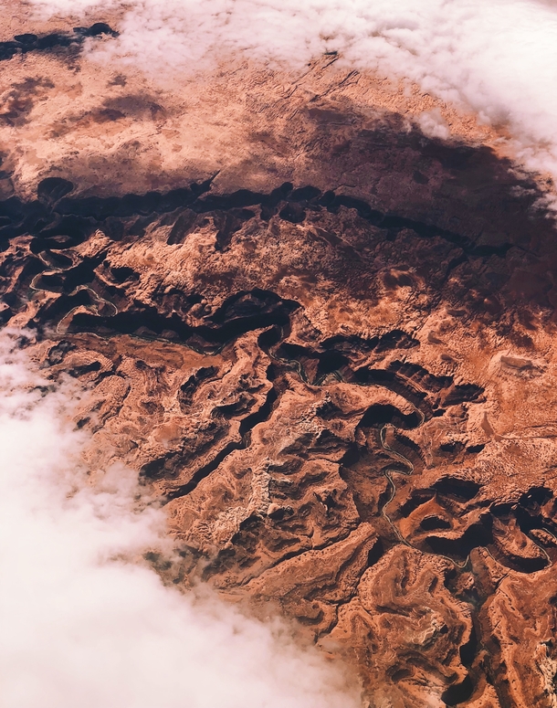 The clouds parted at just the right spot over Glen Canyon Utah during my flight 