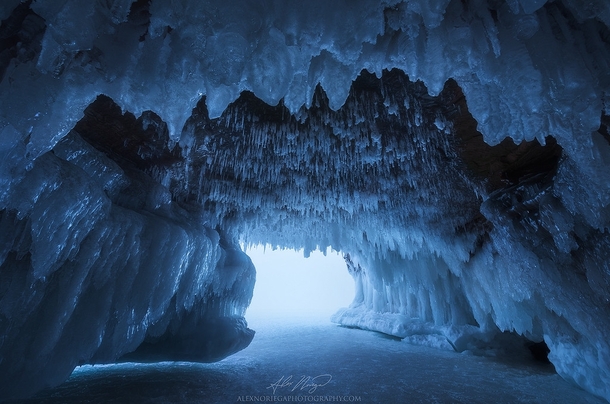 The Crystal Maw - Inside Wisconsins Lake Superior Ice Caves  - Photo by Alex Noriega