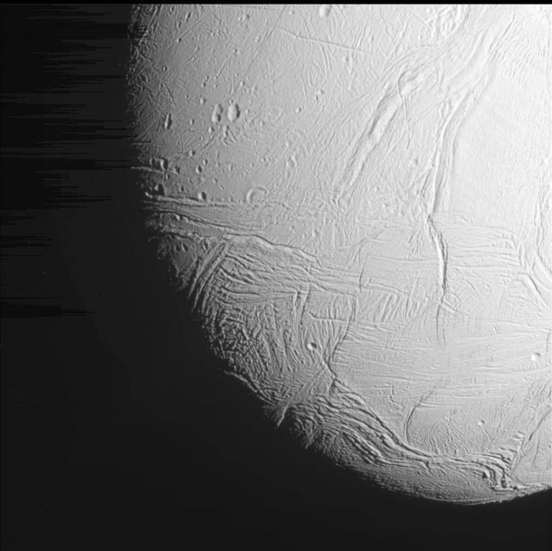 The frozen surface of Saturns moon Enceladus