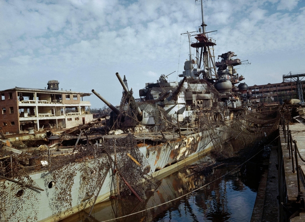 The German cruiser Admiral Hipper sits abandoned in a dry dock at Kiel after being damaged by RAF raids 