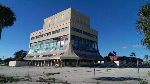 The Glass Bank in Cocoa Beach FL abandoned after  hurricanes 