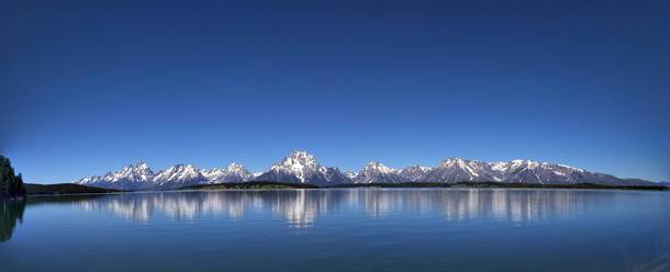 The Grand Teton as seen from Jackson Lake around Noon in June  