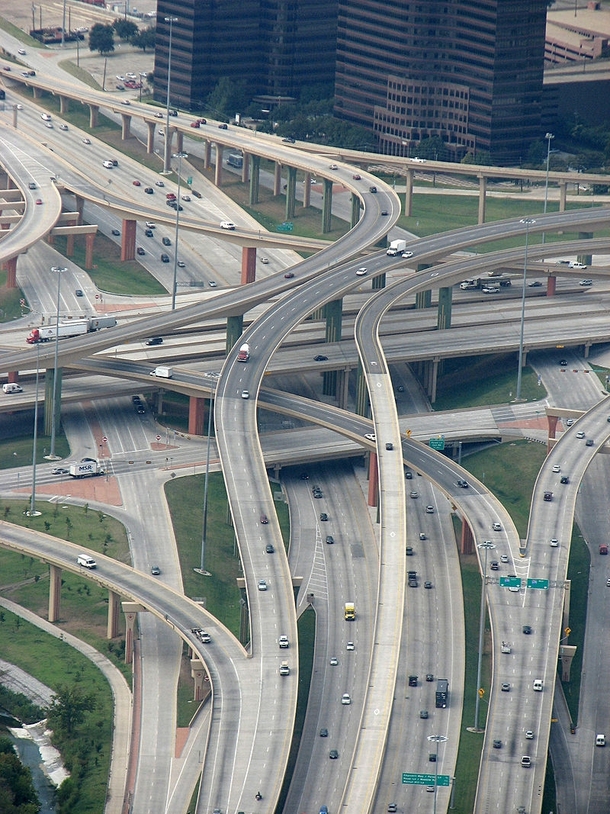 The High Five Interchange in Dallas is  levels- US  on the Bottom Level Frontage Roads on the Second the LBJ freeway I- on the Third and flyover ramps on the Fourth and Fifth