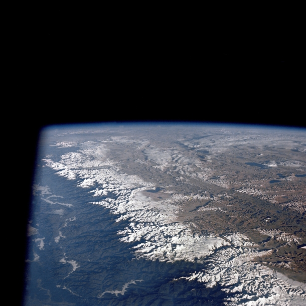 the Himalaya mountains as seen from the Apollo  spacecraft Mount everest can be seen in the lower center of the picture Photo by NASA 