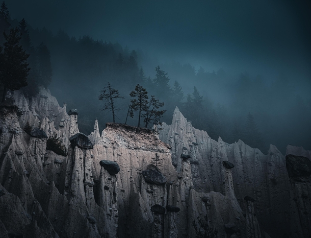 The incredible out of the world Earth pyramids one moody evening somewhere in South Tyrol Dolomites Italy  OC IG arvindj
