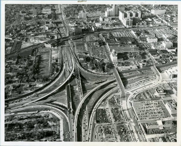 The Interchange of I- and MI- in Detroit was the first full freeway to freeway interchange in the United States opening in  Its unique for using left hand exit and entrance ramps for left turns