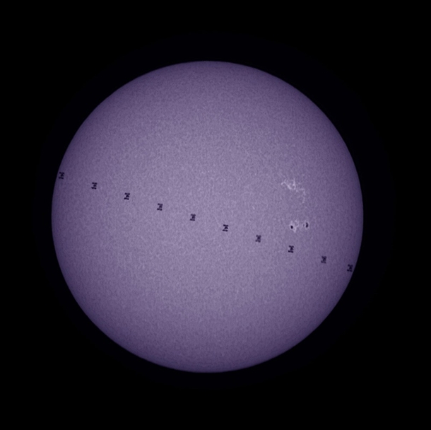 The International Space Station crosses in front of the Sun