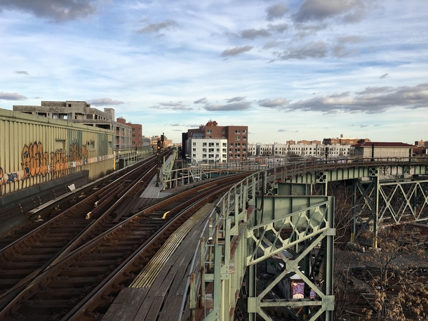 The IRT New Lots Avenue Line where it crosses above the BMT Canarsie Line at Junius Street Brooklyn 