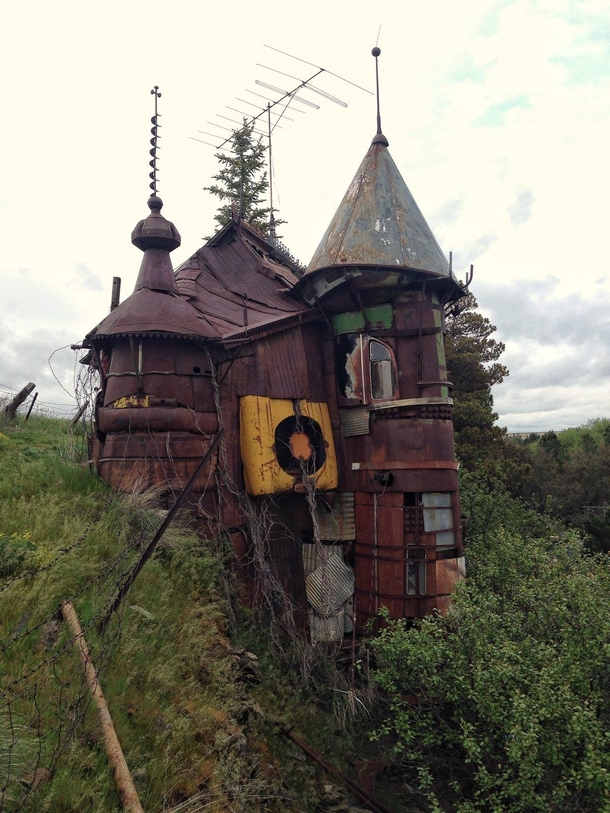 The Junk Castle - built in the s by art teacher Victor Moore out of junk windows are recycled washing machine glass etc in Whitman County Washington