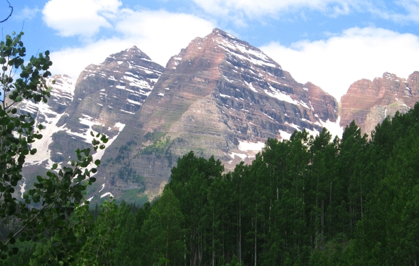 The Maroon Bells in the Elk Mountains Gunnison and Pitkin County Colorado  by Hogs
