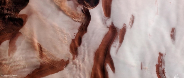 The Mars Orbiter just sent back this incredible photo of the red planets icy north pole