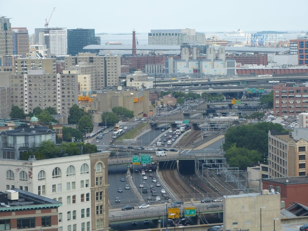 The Mass Pike and the train line running from Back Bay to South Station in Boston The Southeast Expressway is visible running perpendicular 