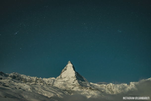 The Matterhorn lit by moon light The fog had cleared for just a few minutes allowing me to take a photo 