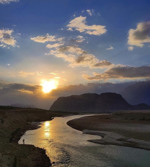 The mesmerising and soothing sunsets of Skardu Pakistan Of all the places it has special evenings with perfect breeze reflecting lights over Indus with soft sun setting rays over the mountains x - 