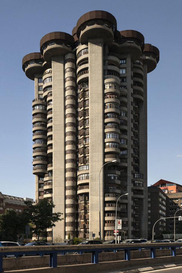 The -metre-high Torres Blancas in Madrid was designed in  and has striking cylindrical elements