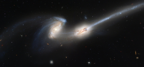 The Mice NGC  Colliding Galaxies With Tails of Stars and Gas 