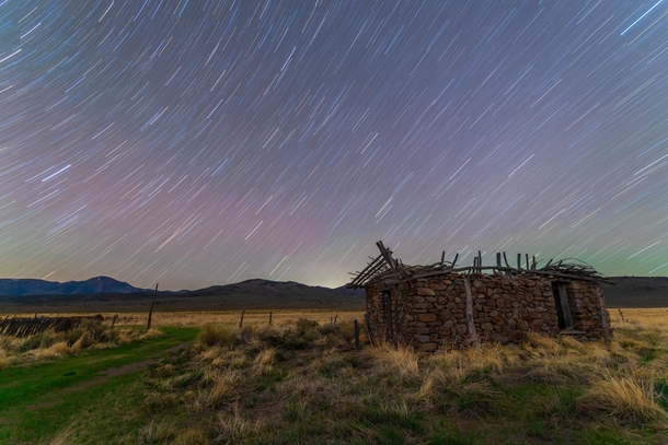 The middle of Nevada is fantastic I love traveling to remote places and stumbling upon relics of our past Imagine living in this stone hut yrs ago herding cattle The vast skies the open vistas and the deafening silence create a surreal experience found on