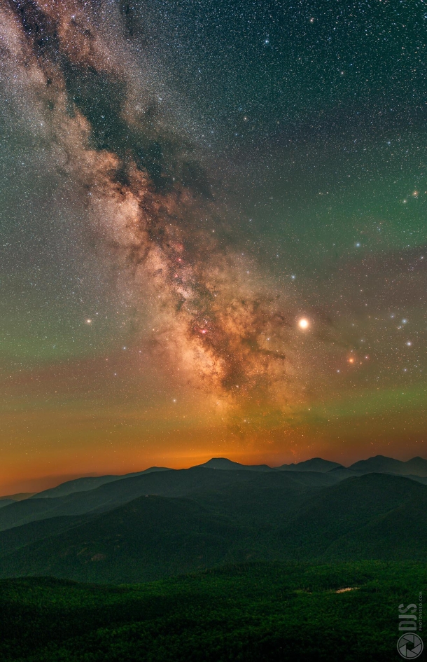 The Milky Way rising amongst oodles of atmospheric airglow atop the Adirondack Mountains in NY 