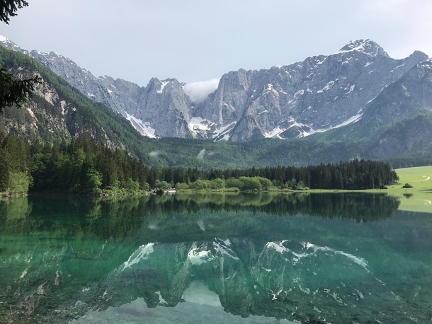 The mirroring effect at the Lago di Fusine Italy 