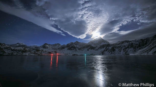 The moon lights up a frozen King Edward Cove South Georgia Antarctica 