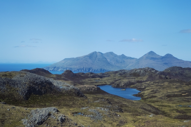 The mountains of Rum from An Sgurr Isle of Eigg Scotland  OC