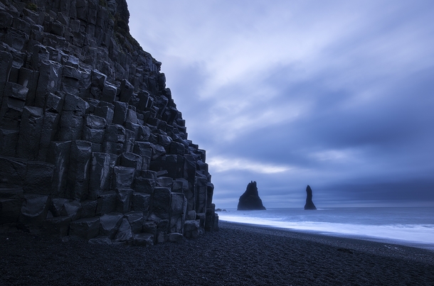 The otherworldly basalt columns of Reynisfjara one of Icelands famous black sand beaches 