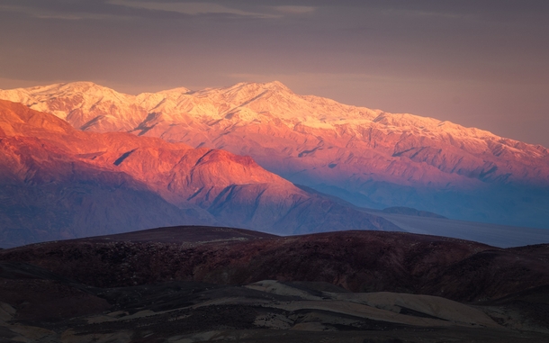 The Panamint Range catching the first light over Death Valley CA 