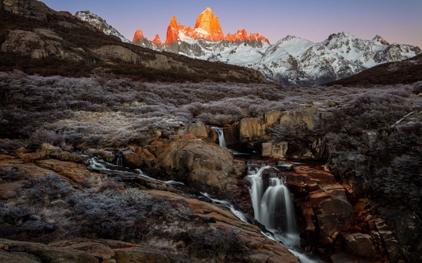 The Peaks of Cerro Fitz Roy Catch Fire at Sunrise Over Frozen Patagonia El Cheltan Argentina   x  px