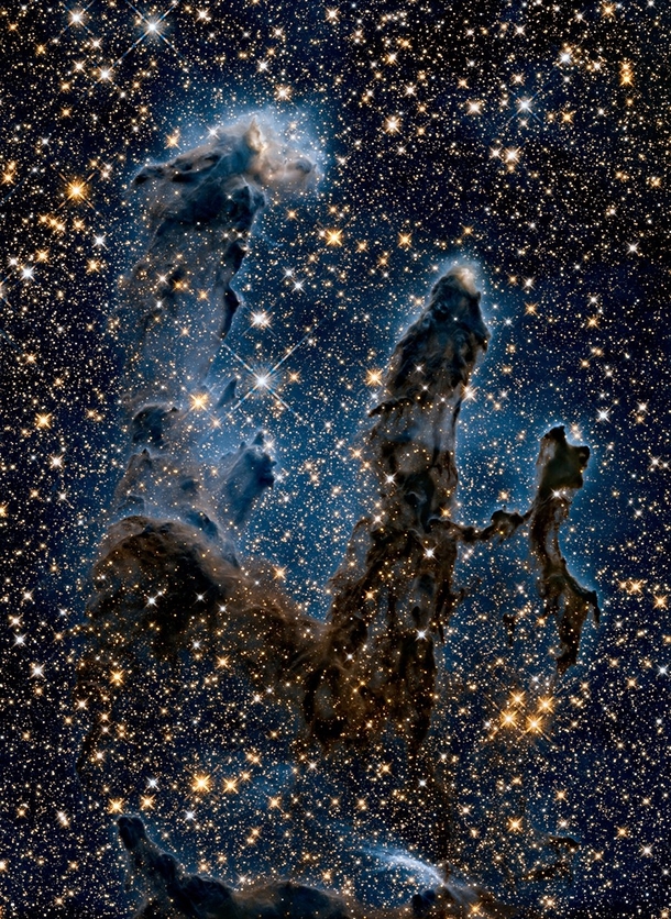 The Pillars of Creation The light from young stars being formed pierce the clouds of dust and gas in the infrared Credit NASA ESA and the Hubble Heritage Team STScIAURA