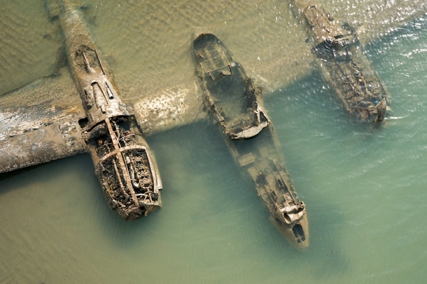 The remains of an American WWII aircraft that crashed on a beach in Wales 