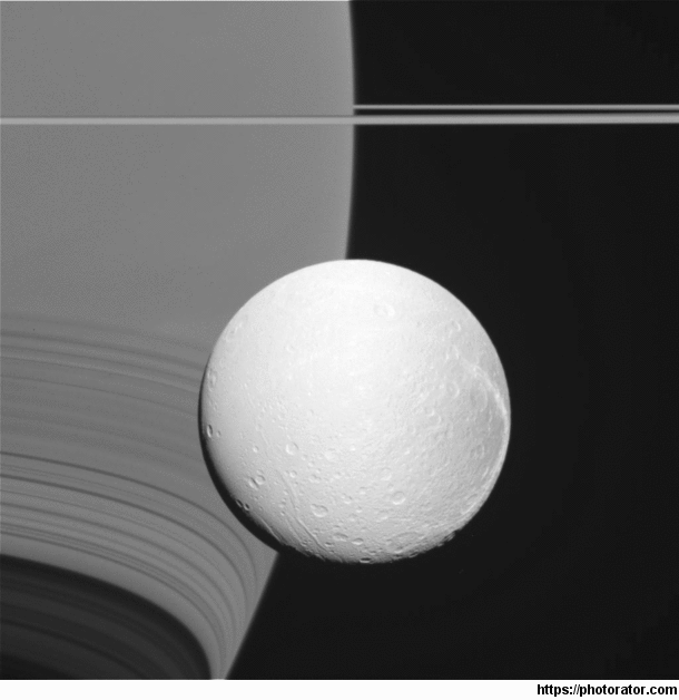 The same shot of Dione and Saturn but instead animated to show the parallax between the frames Credits NASA JPL-Caltech Space Science Institute Cassini Imaging Team