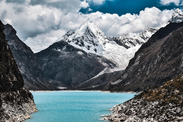 The stunning ice blue waters of Laguna Paron surrounded by snow-capped colossi 