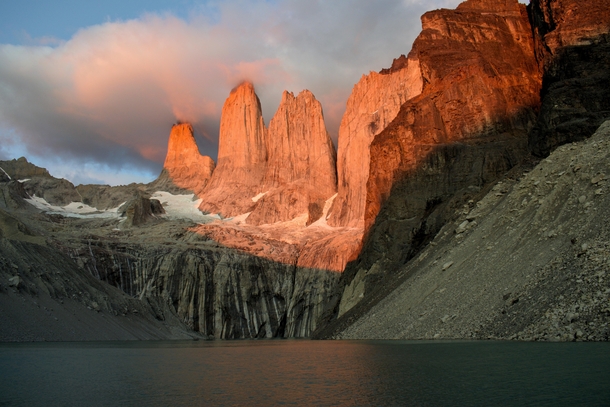 The sun rising over this magnificent planet Torres Del Paine 