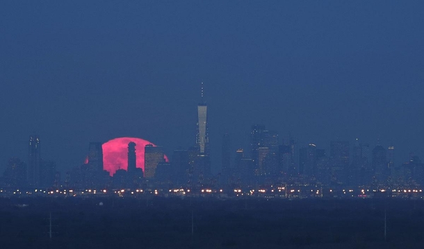The super snow moon rises behind Manhattan on February   by Gary Hershorn 