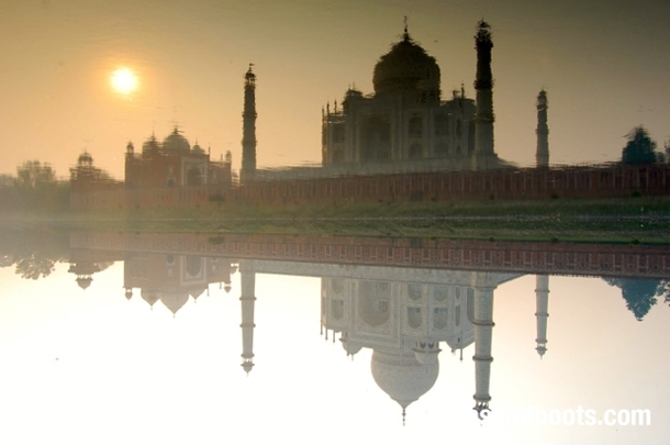 The Taja Mahal reflecting in the River Yamuna Agra India 