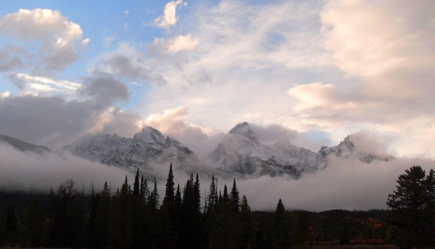 The Tetons play hide and seek in the clouds 