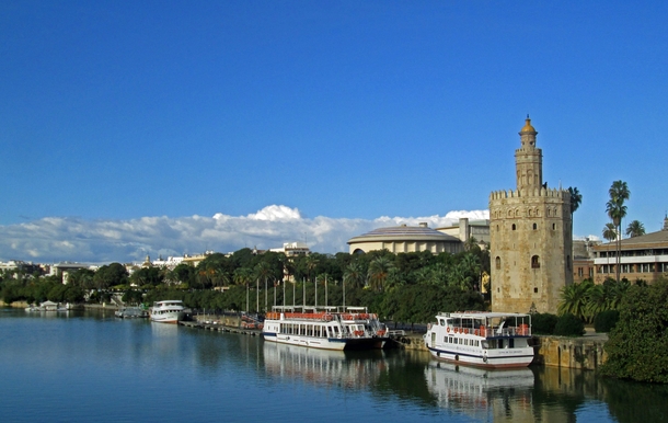 The Torre del Oro by the water in Seville Andalusia 