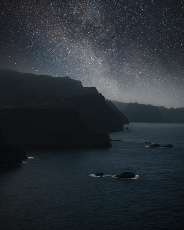 The upper Milky Way rising over the cliff faces of Madeira Portugal 