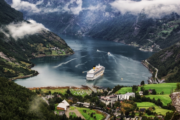 The village is Geiranger at the head of the Geirangerfjord Norway 