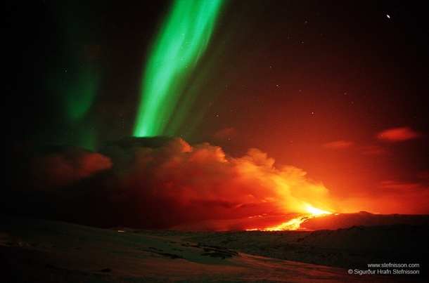 The volcano Hekla erupted at the same time that Auroras were visible overhead The picture was taken in Iceland in 