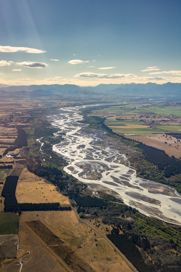 The Waimakariri River Canterbury New Zealand braiding its way to the Pacific Ocean from the mountains 