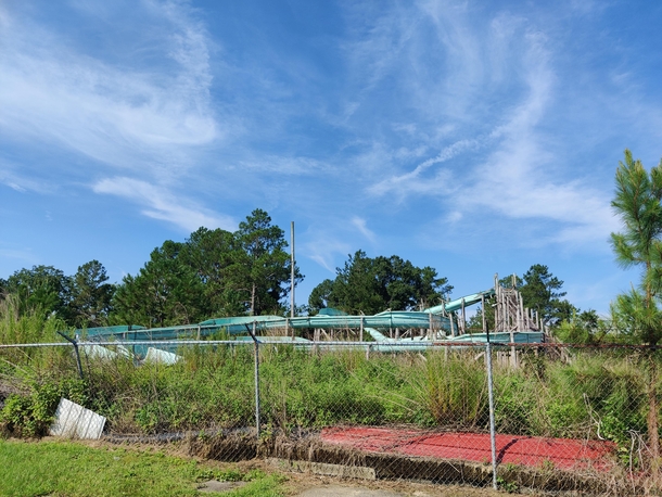 this abandoned waterslide at an also abandoned roller rink outside my home town there used to be goats here